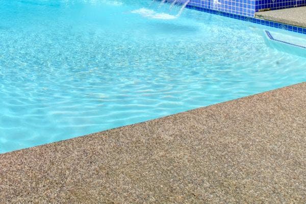 Pool Landscaping With Permeable Paving Concrete Flooring